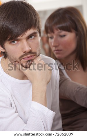 couple crisis - sad man and frustrated woman after conflict