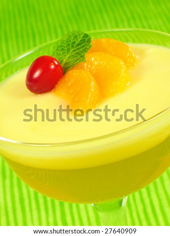 Layered lemon flavored gelatin dessert topped with mandarin oranges.