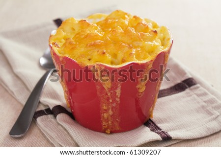 Baked macaroni and cheese, made with cheddar cheese.