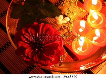 Floating candles and flower