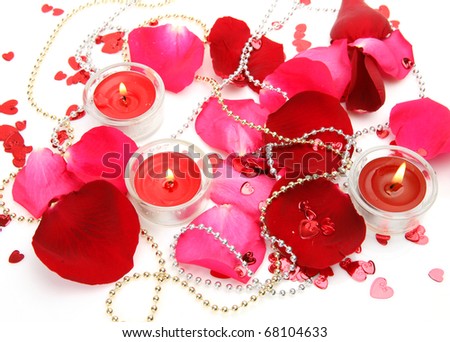 Petals of roses and candles