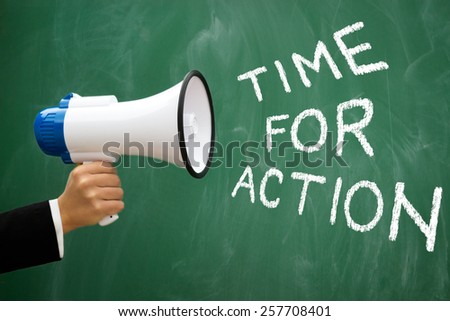 Megaphone with green blackboard with written words: Time for action
