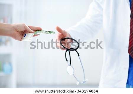Corrupt doctor receives money from patient