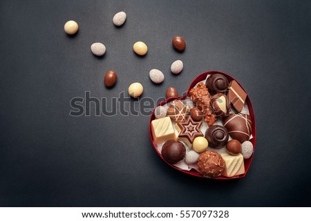 Chocolate box for Valentines Day on dark background