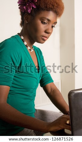 Attractive Black Woman on Computer