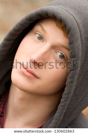 Portrait of Gorgeous Young Man in Hood