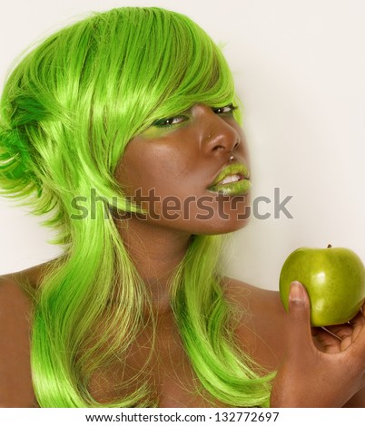 Woman in Green Wig With Green Apple