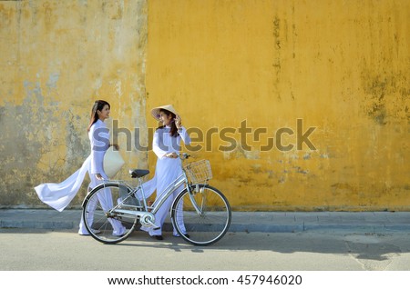 Beautiful  woman with Vietnam culture traditional ,vintage style,Hoi an Vietnam