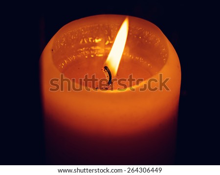 candle flame at night closeup