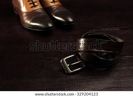 stylish leather men\'s dress shoes and belt