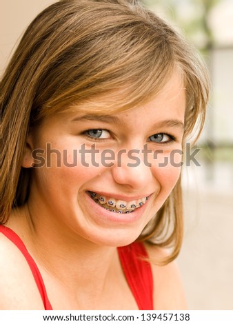 Girl smiling with Braces