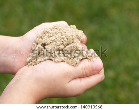 Little Hands Cupping Sand
