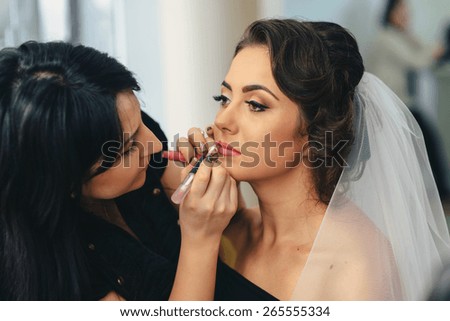 Beautiful happy bride with wedding hairstyle bright makeup in bridal day in love. Happy sexy girl waiting for groom. Romantic lady beauty model bride in bridal day have final preparation for wedding