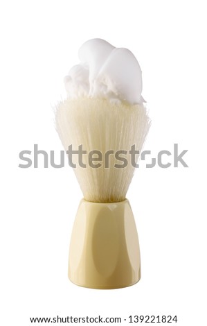 A shaving brush in badger hair with shaving cream. isolated on white background