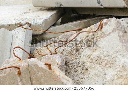 Detail of old and damaged reinforced concrete slabs on an abandoned construction site
