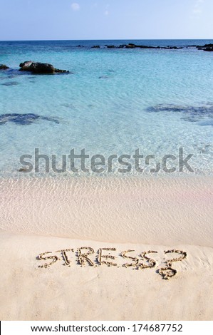 Word Stress written on sand, with a question mark,  relax concept
