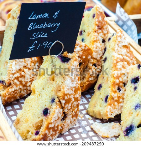 Delicious lemon and raspberry cake slices in British market