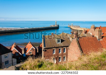 Whitby, North Yorkshire, UK - October 12, 2014: Scenic view of Whitby city in autumn sunny day.Whitby is a seaside town and port in North Yorkshire, UK