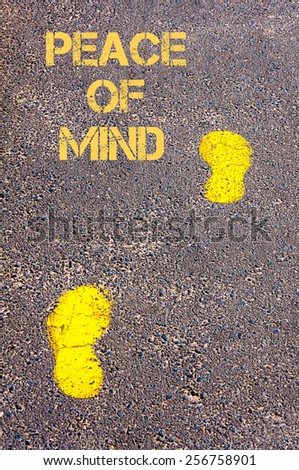 Yellow footsteps on sidewalk towards Peace of Mind message, Serenity conceptual image