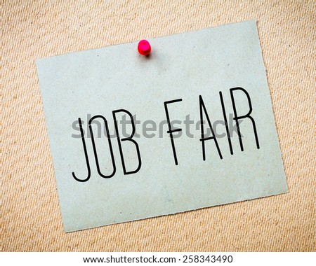 Recycled paper note pinned on cork board.Job Fair Message. Business Concept Image