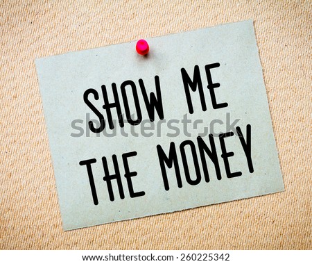 Recycled paper note pinned on cork board. Show me the money Message. Concept Image