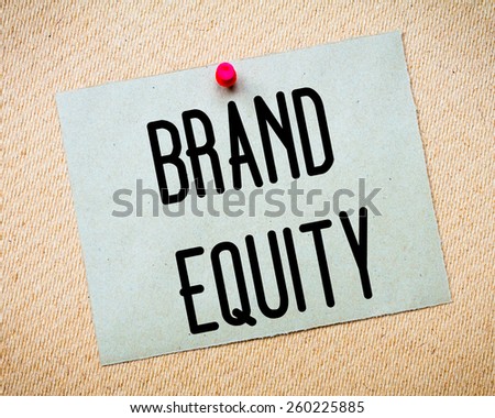 Recycled paper note pinned on cork board. Brand Equity Message. Concept Image