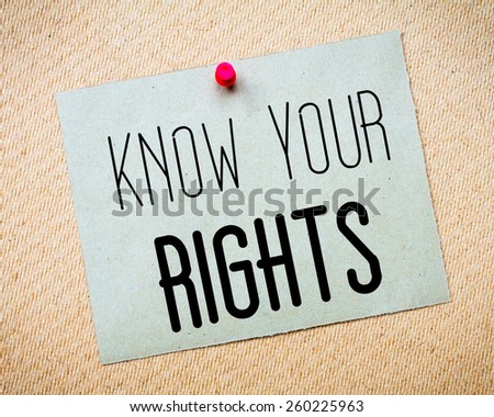 Recycled paper note pinned on cork board. Know Your Rights Message. Concept Image