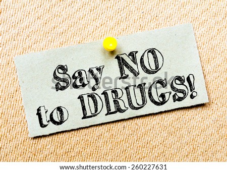 Recycled paper note pinned on cork board.Say No to Drugs Message. Concept Image