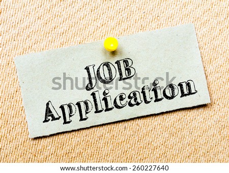 Recycled paper note pinned on cork board. Job Application Message. Concept Image
