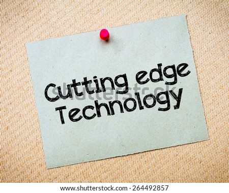 Cutting Edge Technology Message. Recycled paper note pinned on cork board. Concept Image