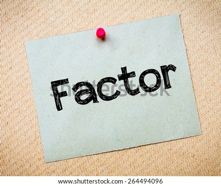 Factor Message. Recycled paper note pinned on cork board. Concept Image