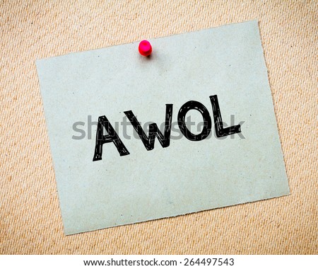 AWOL - Absent Without Official Leave Message. Recycled paper note pinned on cork board. Concept Image
