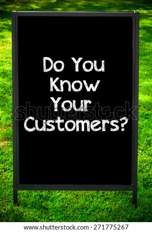 DO YOU KNOW YOUR CUSTOMERS?  message on sidewalk blackboard sign against green grass background. Copy Space available. Concept image