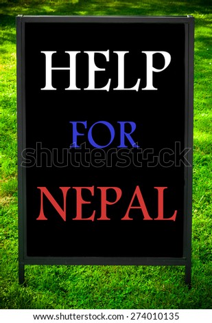 HELP FOR NEPAL  message on sidewalk blackboard sign against green grass background. Concept image