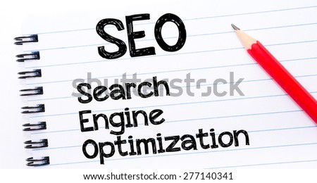 SEO acronym as Search Engine Optimization Text written on notebook page, red pencil on the right. Concept image