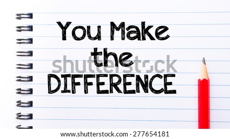 You Make The Difference Text written on notebook page, red pencil on the right. Motivational Concept image
