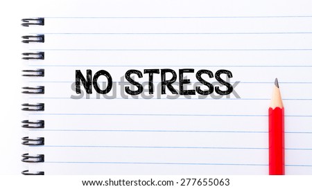 No Stress Text written on notebook page, red pencil on the right. Motivational Concept image