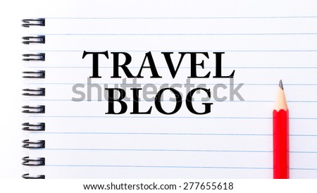 Travel Blog Text written on notebook page, red pencil on the right. Motivational Concept image