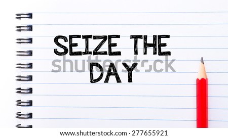 Seize the Day Text written on notebook page, red pencil on the right. Motivational Concept image