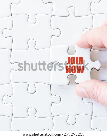 Missing jigsaw puzzle piece with message JOIN NOW. Business concept image for completing the puzzle.