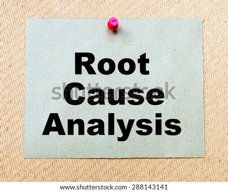 Root Cause Analysis written on paper note pinned with red thumbtack on wooden board. Business conceptual Image