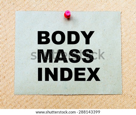 Body Mass Index written on paper note pinned with red thumbtack on wooden board. Business conceptual Image