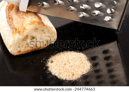 bread crumbs grated on kitchen table