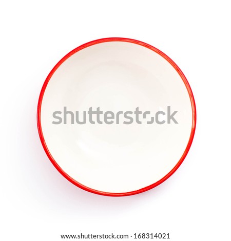 Round empty bowl with red edge. Top view, isolated on white background.