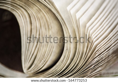 Closeup of rolls of newspapers with shallow depth of field