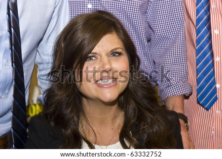 SAN DIEGO - JULY 22: Tiffani Amber Thiessen of White Collar attends Comic-Con 2010 - Day 1 on July 22, 2010 in San Diego, California.