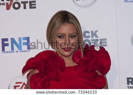 HOLLYWOOD, CA - FEBRUARY 11: Actress/Singer Aubrey O\'Day arrives at the 14th annual \'Friends \'N\' Family\' GRAMMY event at Paramount Studios on February 11, 2011 in Hollywood, California.