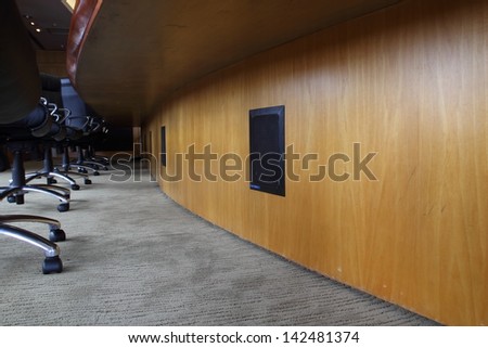 Speakers under the table for modern meeting rooms.