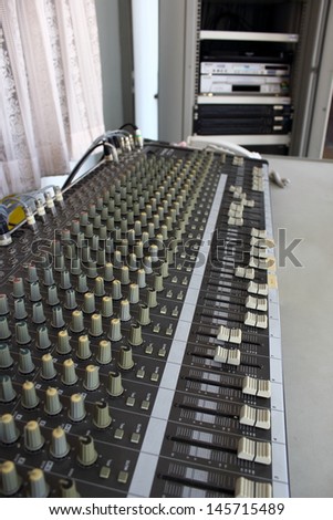 mixing console in control room