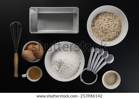 ingredients and tools to make a cake